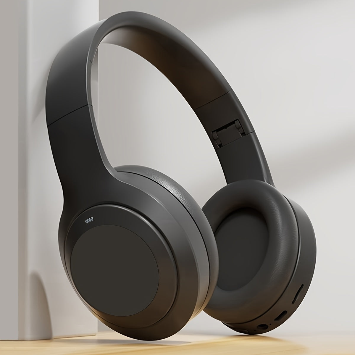 Auriculares inalámbricos con cancelación de ruido y micrófono, plegables y ligeros, con graves profundos y alta fidelidad, ideales para viajes y trabajo.